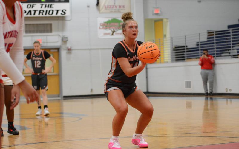 Senior point guard Dakota Phillips sinks a free throw in the scrimmage win over the Lady Patriots of Oglethorpe County on Nov. 9.