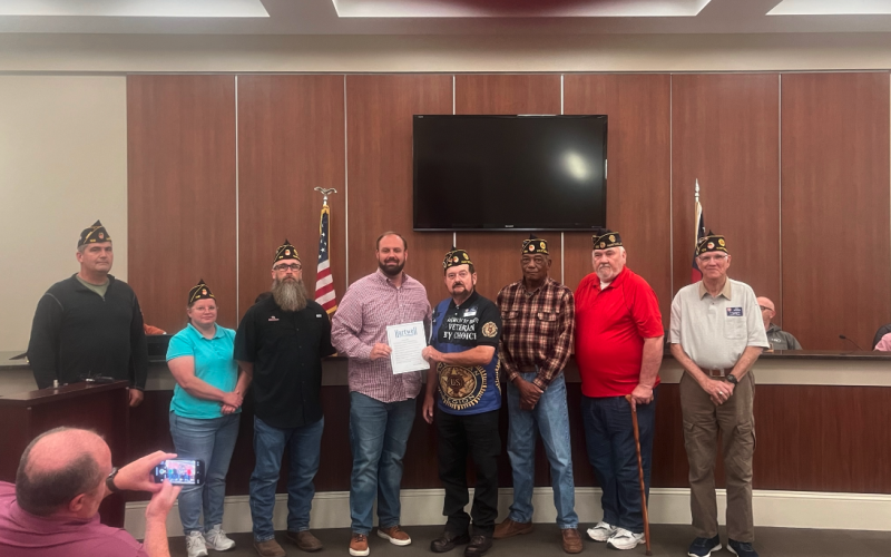 Commander James Fulghum and the men and women from American Legion Post 109 accept a Veteran’s Day proclamation from Hartwell mayor Brandon Johnson.