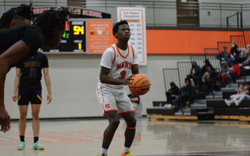 Junior guard Andrew Maxwell led the Dogs in scoring with 16 points in the home loss to Monroe Area, 69-60.