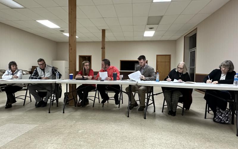 From left to right: Joyce Rumsey, Matthew Butler, Alicia Barnett (new council members), Mayor John Smith, attorney Matt Easom, town clerk Mary Dowell, former town clerk Elaine Evans