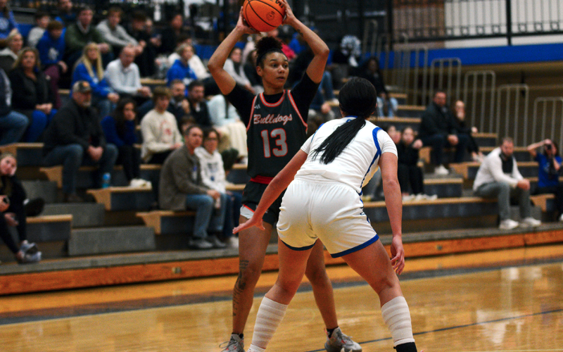 Senior forward Alexis Walker looks to pass the ball to an open teammate in the 44-31 road loss against Oconee County.