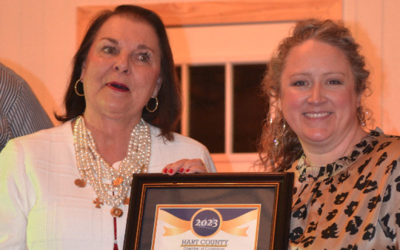 One Hart Beat Foundation Director Bobbie Busha (left) accepts the award for Non-Profit Organization of the Year from Chamber director Lindsey Ingle.