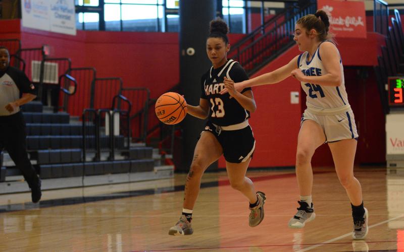 Senior forward Alexis Walker drives to the basket in the 54-48 loss to the Lady Warriors of Oconee County on Feb. 14.