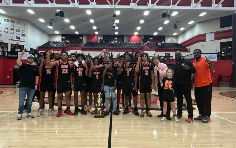 The Hart County High School boys basketball team pulled off the upset over No. 2 ranked Hebron Christian to capture the 2023-2024 Region 8-AAA Championship on Feb. 16, 59-53.