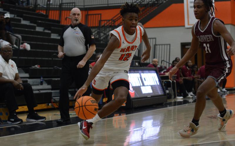 Freshman guard Kurston Curry led the team in scoring with 18 points in the 64-62 win over the Dragons of Pickens.
