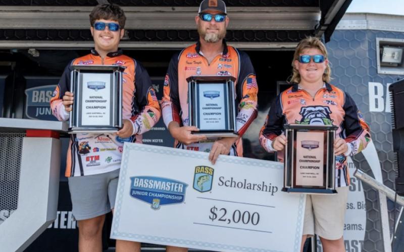 Pictured from left is Luke Schnell, Isaac Temple, and Kale Temple during the Bassmaster Junior National Championship awards ceremony where they were crowned National Champions in July of 2023.