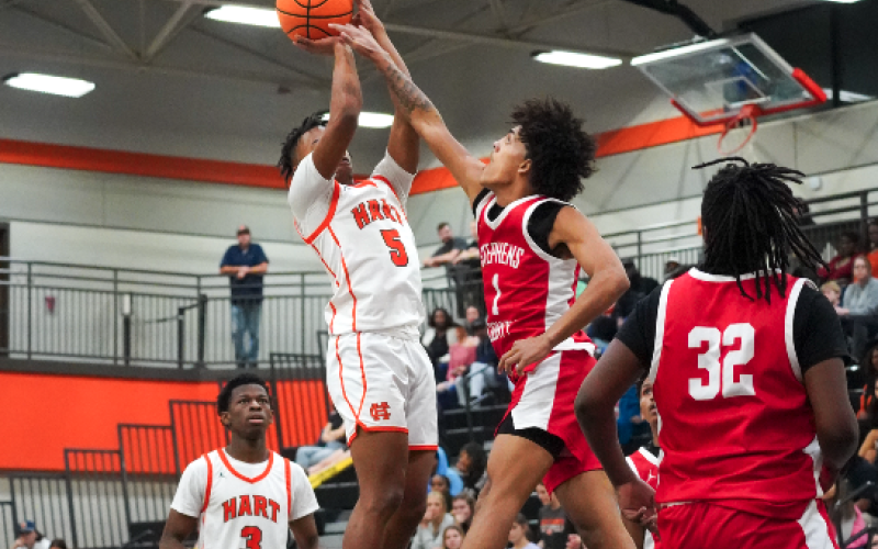 Senior guard Jashon Gaines shoots over an Indian defender in the 66-64 home loss to Stephens County on Feb. 2.