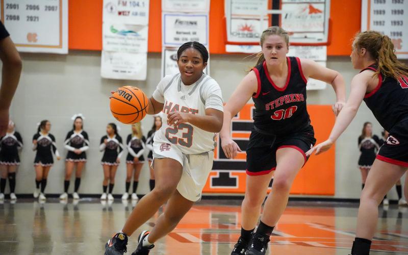 Junior guard TK Smith (23) drives into the lane as she was the co-leading scorer for the Lady Dogs with 17 points as Hart defeated the Lady Indians of Stephens County on Feb. 2, 55-43.