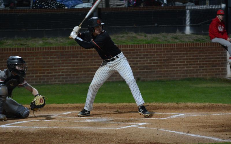 Pictured is senior shortstop Zach Dombrosky as he hit a solo home run in the 10-4 win over the Diamond Devils of Elbert County on Feb. 19.