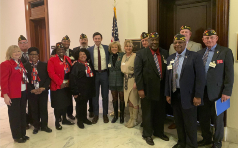 Senator Jon Ossoff with representatives from Veterans of Foreign Wars in 2023.