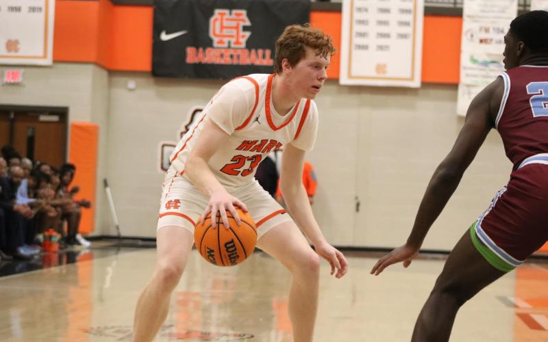 Senior forward Avery Strickland looks to drive to the basket in the 76-53 loss to Carver (Columbus) in the Elite Eight. Photo by Grayson Williams/Hart County Charter System
