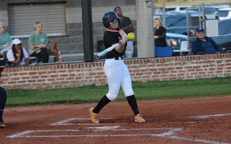 Freshman second baseman Carly Dutton goes 3-3 in the 12-6 win over East Jackson.