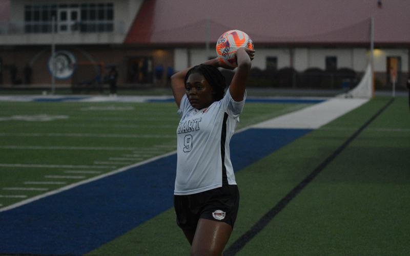 Freshman defender Aidyn Craft throws the ball into play.