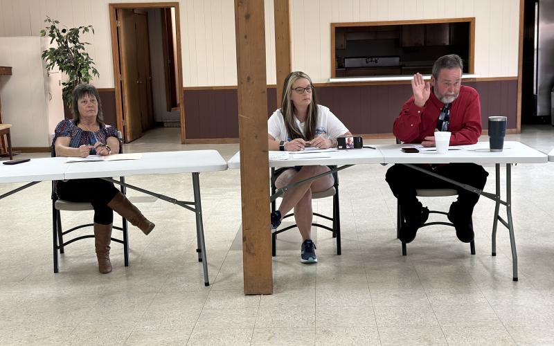 Bowersville leadership hears residents voice their opinions about the historic Cheek building. From left to right: Joyce Rumsey, Alicia Barnett, and Mayor John Smith.
