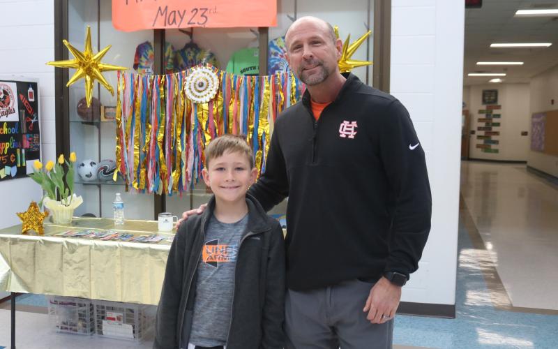 SHES YGA winner: Pictured, left, is South Hart Elementary School second-grade student Weston Berelc alongside Dr. J.T. Stewart, principal. Weston was one of two system-wide 2023-2024 Young Georgia Author contest winners who have been selected as Pioneer RESA Region winners for the contest and will be moving on to the state competition.