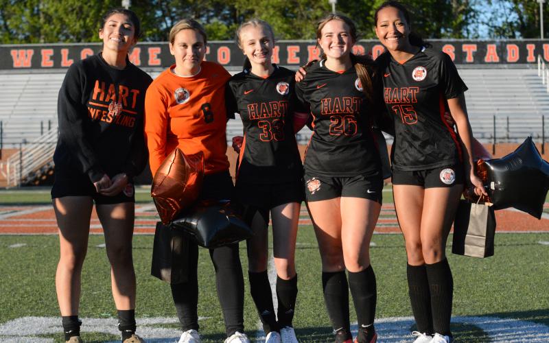 Pictured is the girls soccer senior class. From left is goalkeeper Gelsey Aguilar, goalkeeper Caitlynn Clark, forward Chloe Bennett, midfielder Abigail Luney, and midfielder Aleesha Heaton.