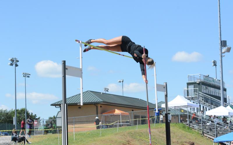 Pictured is senior pole vaulter Amelia Johnson as she captured a region championship in her respective event.