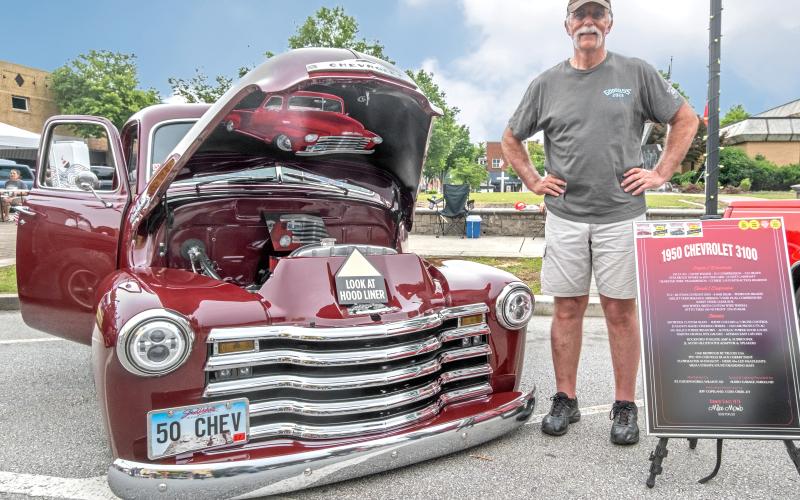 Mike Momb from Sisseton, SD with his 1950 Chevrolet 3100 custom pickup truck. Mike has been traveling to car shows for the past few months and has shown in 14 states. He came to Hartwell from a show in Maggie Valley and was leaving after Cars &amp; Guitars to attend a show in Greenville, SC. Mike plans to continue traveling to car shows during the summer.