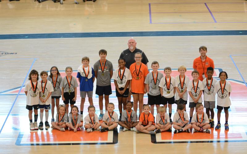 Pictured are the champions and runner-ups of the Hot Shot competition along with HCHS girls coach Mike Edwards and HCHS boys coach Matt Gibbs.