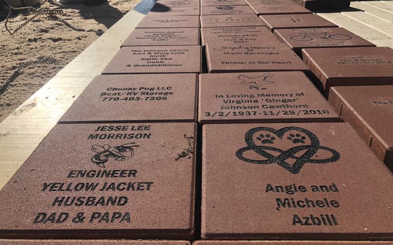The bricks constituting the paver path were installed in February 2023. However, some of these bricks were uneven, leading to people tripping as they used the walkway.