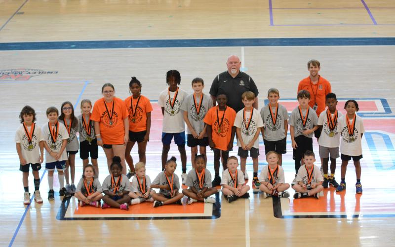 Pictured are the champions and runner-ups of the One-on-One competition along with HCHS girls coach Mike Edwards and HCHS boys coach Matt Gibbs.