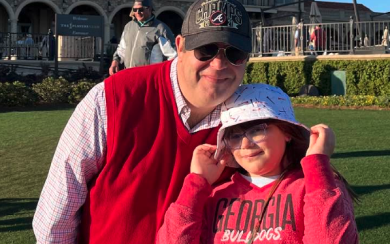 Vivian Fargason (right) on a date with her old man during the third round of the 2022 Players Championship at TPC Sawgrass.