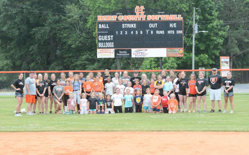 Pictured are the 30 plus campers alongside the HCHS softball players and coaches at the youth camp June 3-5.