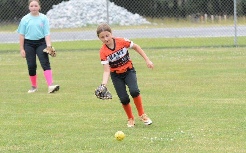 Pictured is Tilly Schnell as she fields a ground ball.