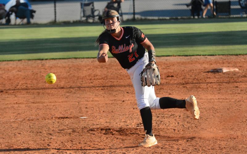 Sophomore pitcher Chesnee Strickland delivers a pitch during a summer league softball game against Commerce.