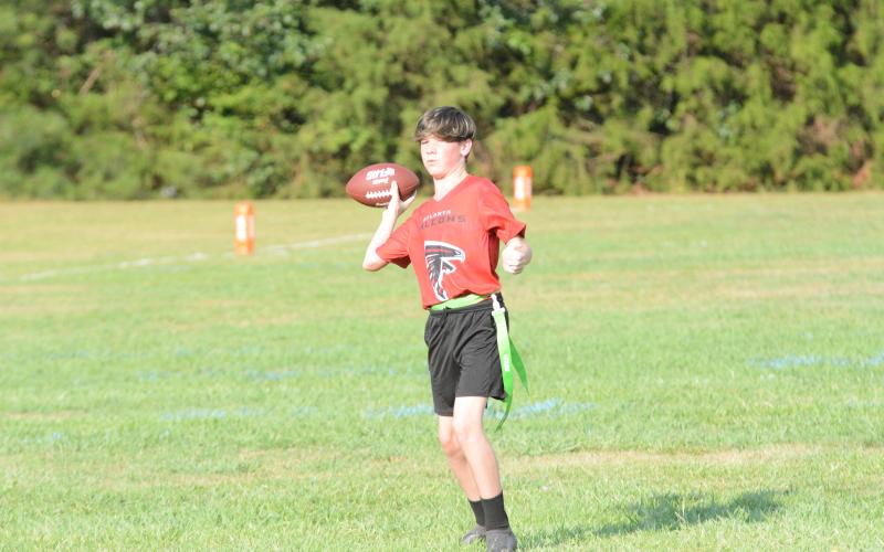 Pictured is Bentley Chappalear as he heaves it to the endzone for a touchdown.