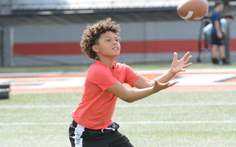 Pictured is O’Neal Murray as he looks to secure the catch.