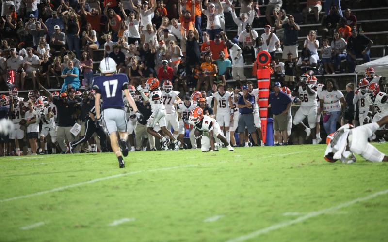 Senior cornerback Andre Austin (9) intercepts the pass in the 17-7 win over Elbert County on Aug. 16. Photo by Mark Wells/The Elberton Star