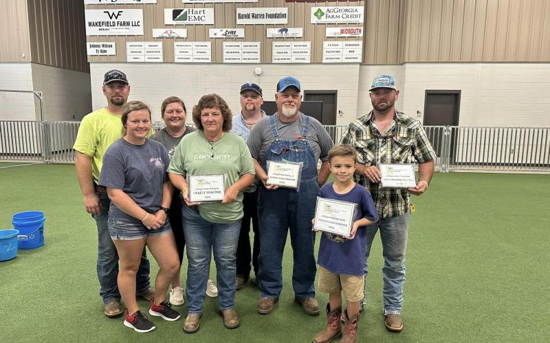 Pictured are attendees who entered into the Antique Tractor Show and earned awards. Winners include: Adam Hayes, People’s Choice; Jerry and Tammy Anderson, Oldest Tractor; Jerry and Tammy Anderson, Best Restored; and Russell Williams, Most Original.