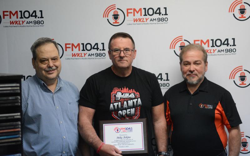 Pictured from left is Bryan Hicks, Mike Atkins, and Bruce Hicks during Atkins 40th anniversary at WKLY.