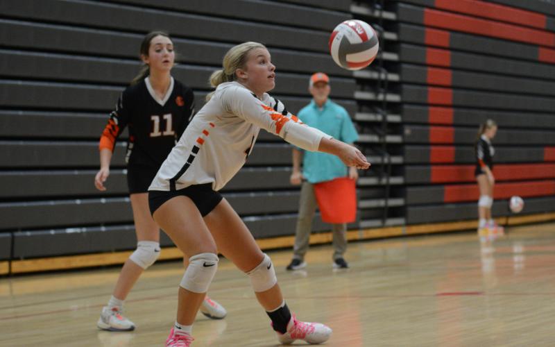Junior Erin Miller sets the ball up as the Volley Dogs go 0-5 in the past five matches.