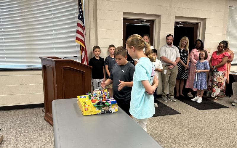 Students participating in the summer SAIL learning academy demonstrate what they learned over the summer. Pictured from left to right: Lincoln Seawright, 5th grader at North Hart Elementary and Millie Colson, 5th grader at South Hart Elementary.