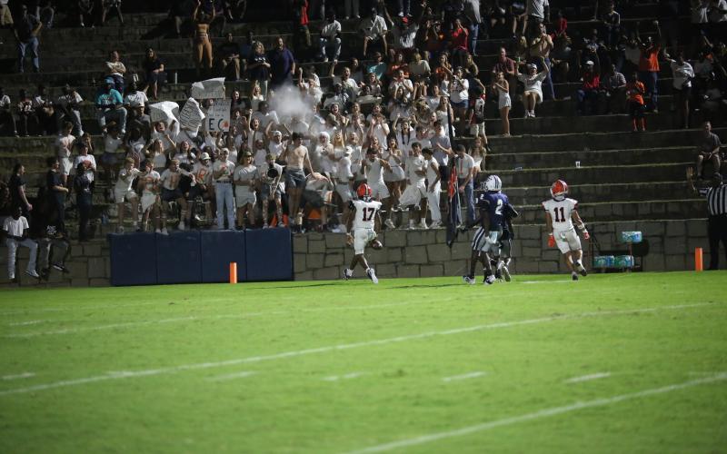Sophomore quarterback Kurston Curry (17) walks into the end zone after receiving the 37-yard trick play pass from junior wide receiver Devin Blakely to elevate the Dogs to a 17-7 win in the Granite Bowl on Aug. 16. Photo by Mark Wells/The Elberton Star