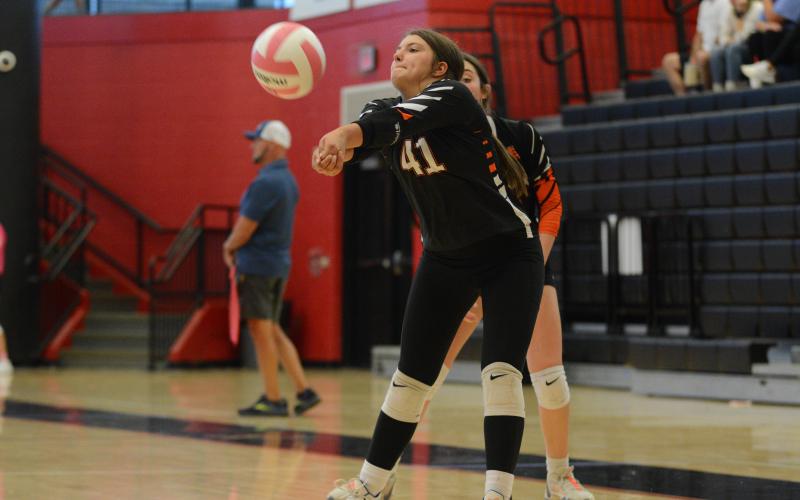 Junior Ashton King digs the ball in the 2-0 (6-25 and 8-25) loss to Hebron.