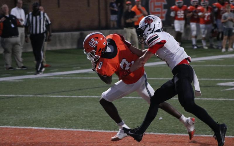 Junior wide receiver CJ Cowins scores twice, once from 55-yards out and the other from 13-yards out, in the 35-14 win over Flowery Branch to improve to 2-2 overall. Photo by Grayson Williams.