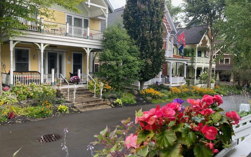 Porches are a prominent feature of homes in Chautauqua. As you walk the tree-lined paths through neighborhoods, you hear lively discussions punctuated with laughter. There is a variety of scheduled “porch chats” on specific topics, but most are impromptu visits among friends—old and new. This photo was taken from the porch of our hosts, Erroll and Elaine Davis. We met in 2008 when Gov. Sonny Perdue appointed me to the Board of Regents and Erroll was chancellor.