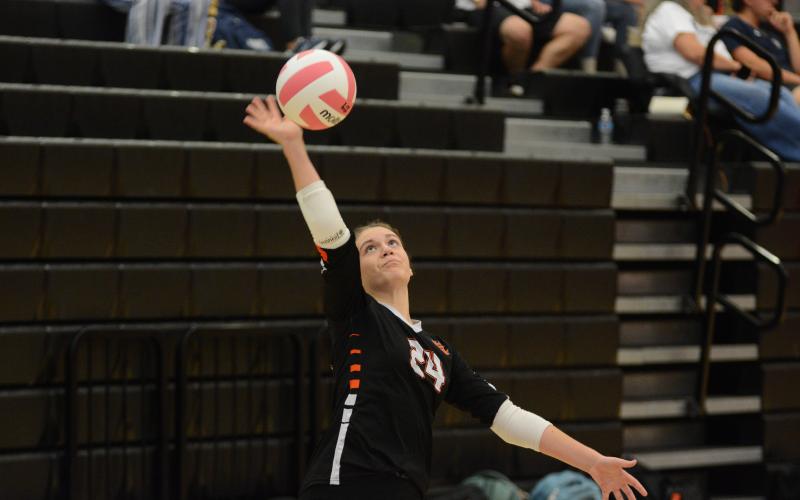 Freshman Coley Phillips serves the ball into play in the 2-0 (25-23 and 27-25) win over Stephens.