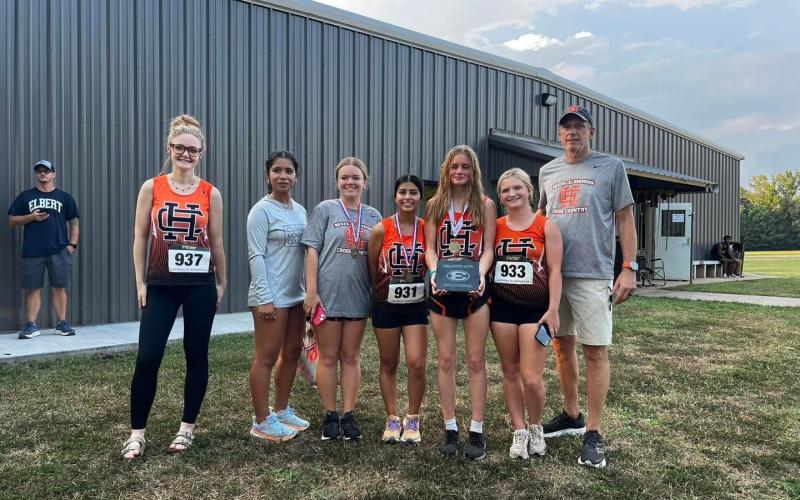 Pictured is the girls team as they placed first overall at the Granite City Invitational.