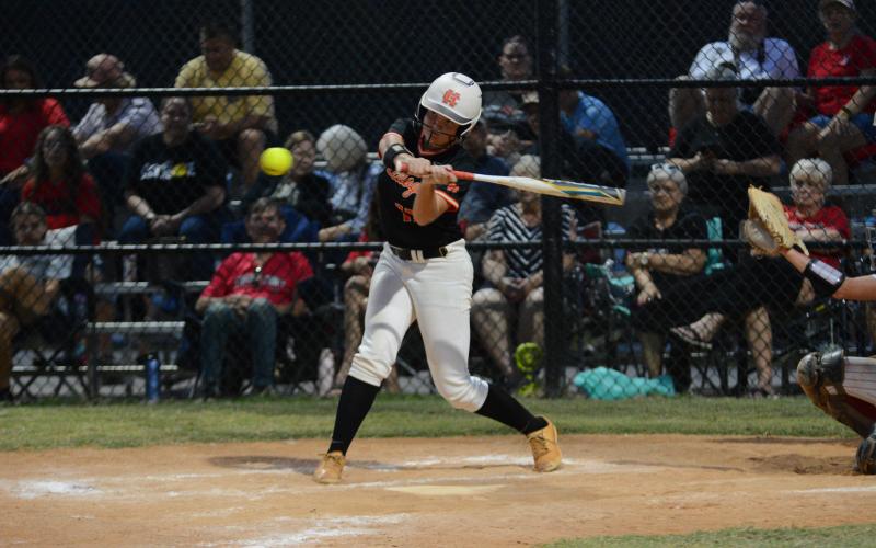 Senior outfielder Skylar Dutton singles on a line drive to center field and also scores a run in the 14-2 loss to the Lady Indians of Stephens County on Sept. 10.