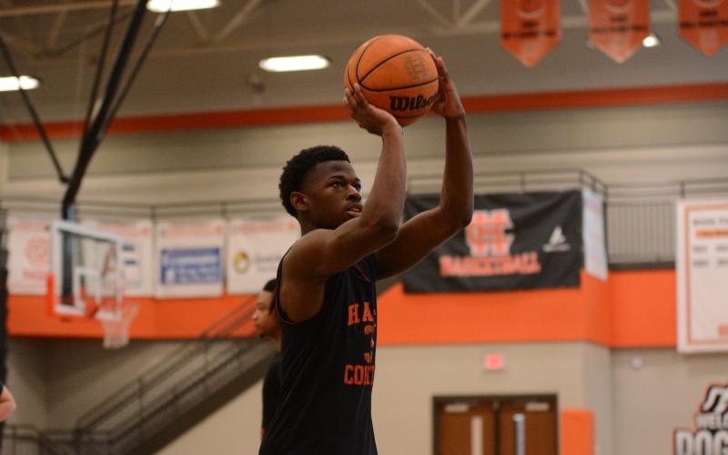 Senior guard Andrew Maxwell during a shooting drill during practice on Oct. 24.