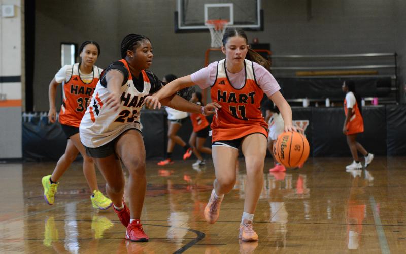 Senior guard TK Smith (left) and junior guard Maddie Carter (right) during a practice scrimmage on Oct. 24.