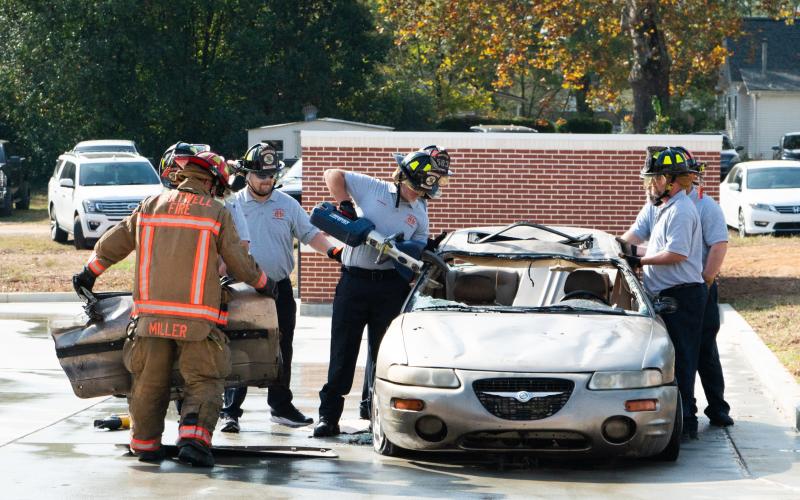 Hartwell firefighters demonstrate the Jaws of Life.