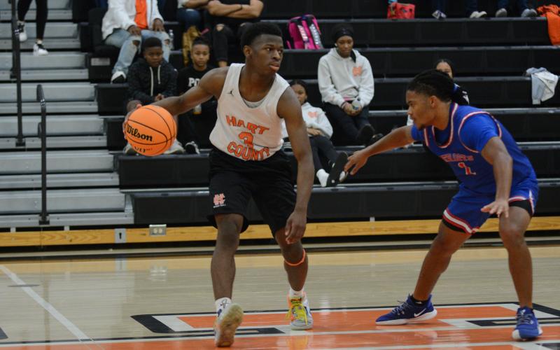Senior guard Andrew Maxwell drops 20 points in 60-49 win over Oglethorpe County in a scrimmage game.
