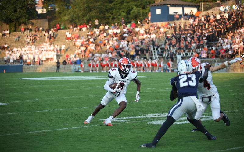 Junior wide receiver CJ Cowins turns up the field after making the catch in the 17-7 win over Elbert County on Aug. 16. Photo by Mark Wells/The Elberton Star