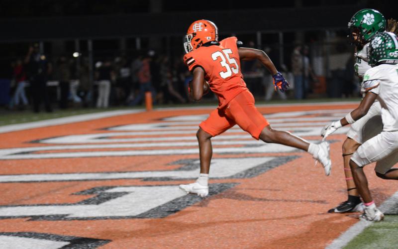 Sophomore running back Faustino Rangel rushes for 106 yards and two touchdowns in the 29-9 win over rival Franklin County to clinch the Dogs spot in the state playoffs.