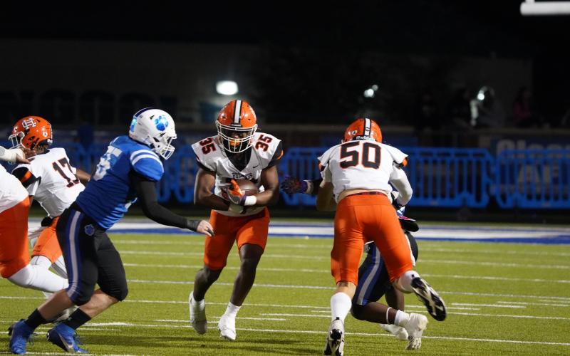 Bulldogs’ sophomore running back Faustino Rangel rushes for only 12 yards on six carries in the 19-0 shutout loss to the Ringgold Tigers in the first round of the state playoffs Nov. 15. Photo by Greg Gaines.